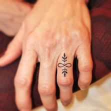 Customized Infinity Finger Tattoo